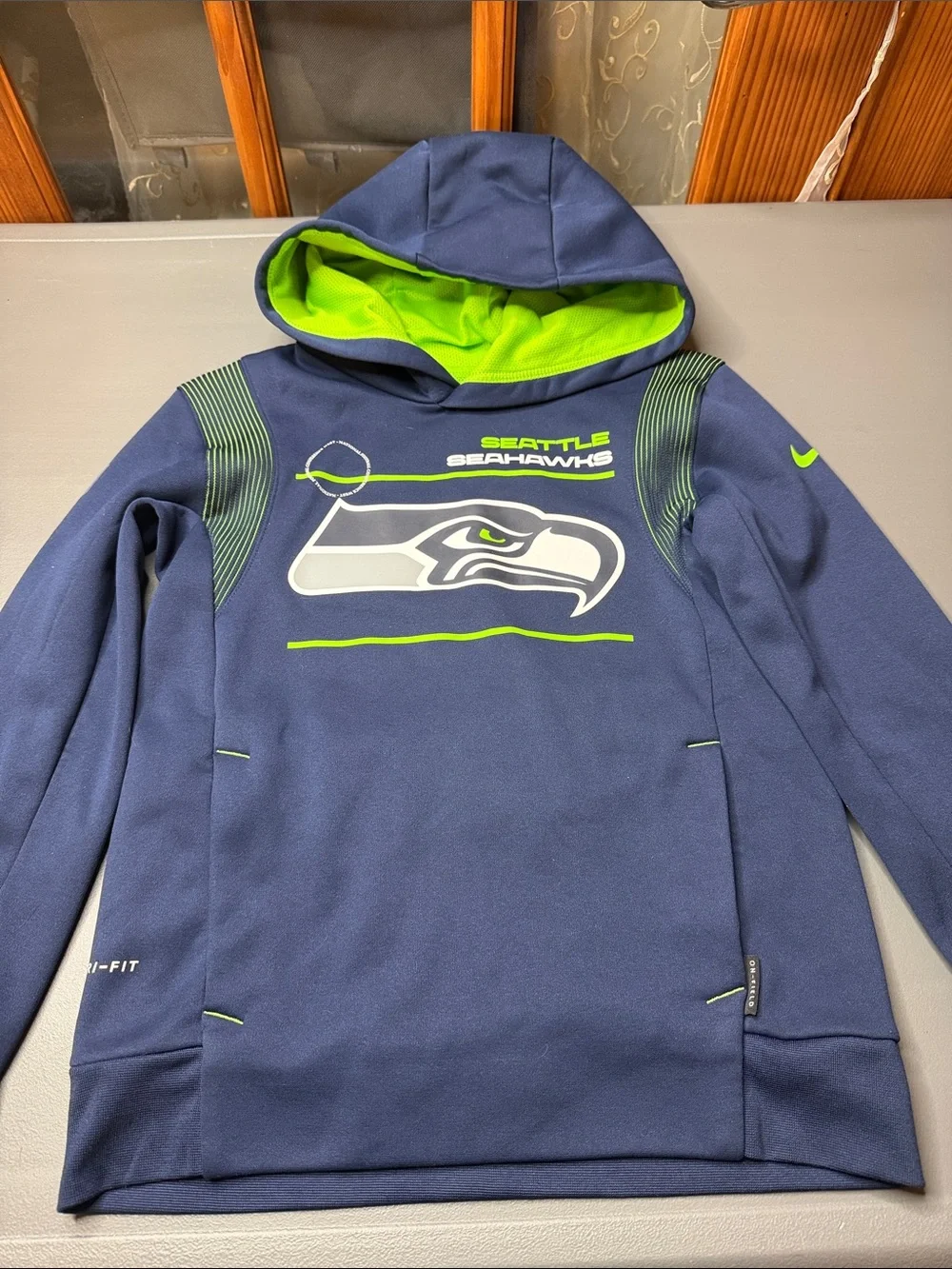 🏈 Nike Kids Seattle Seahawks Navy and Neon Green Hoodie. Size: small/8
